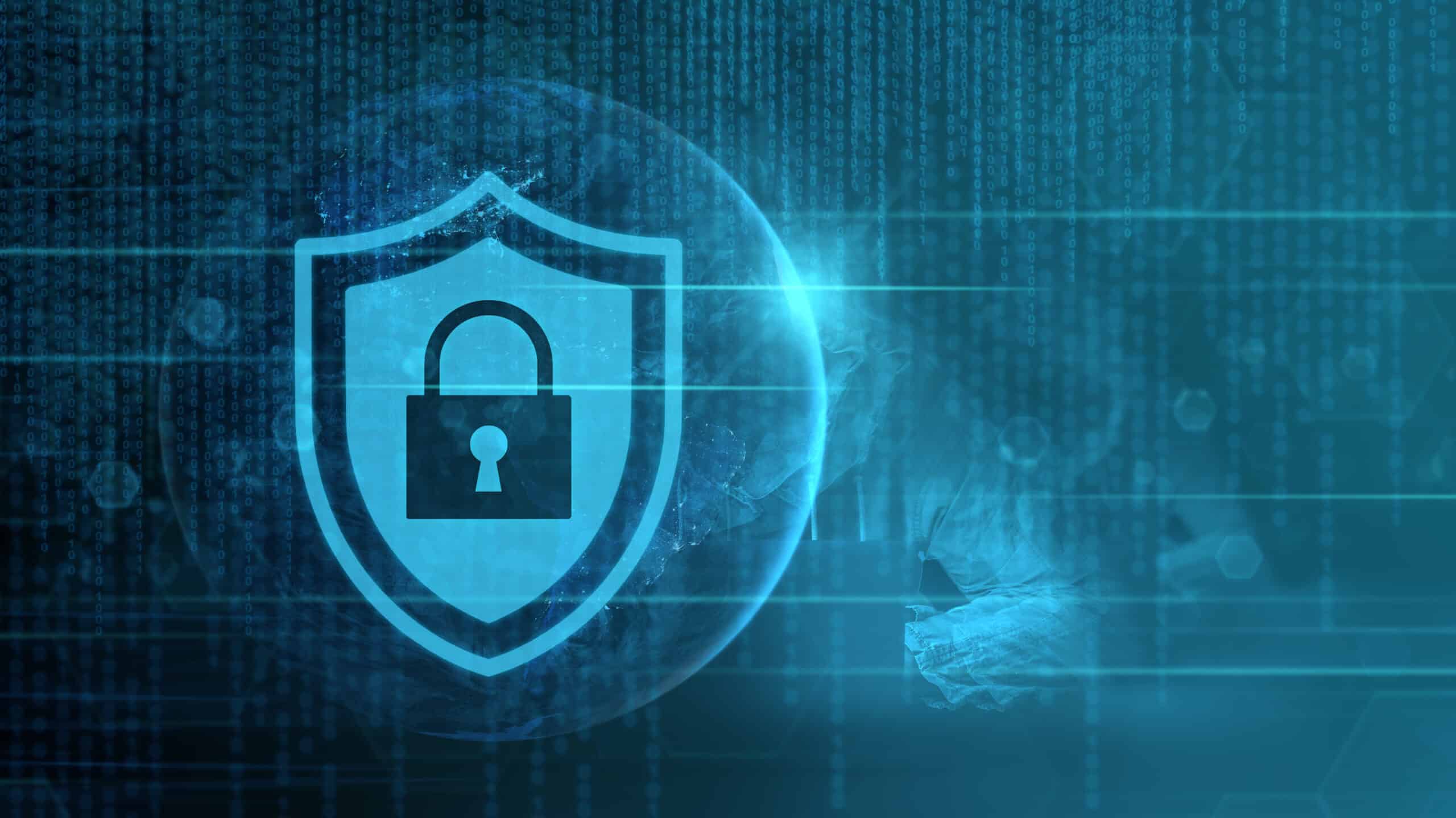 Glowing shield with a padlock over streaming digital code, representing healthcare cybersecurity
