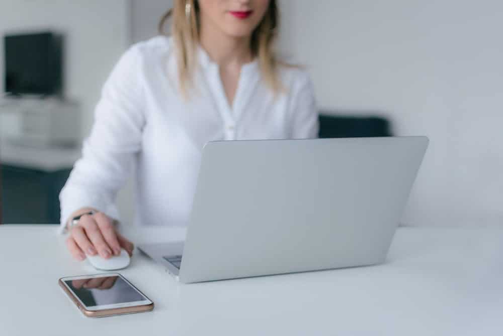 woman sitting on computer